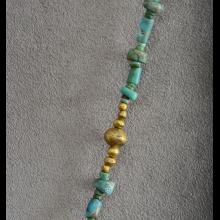 Collier de fouilles en or et turquoise